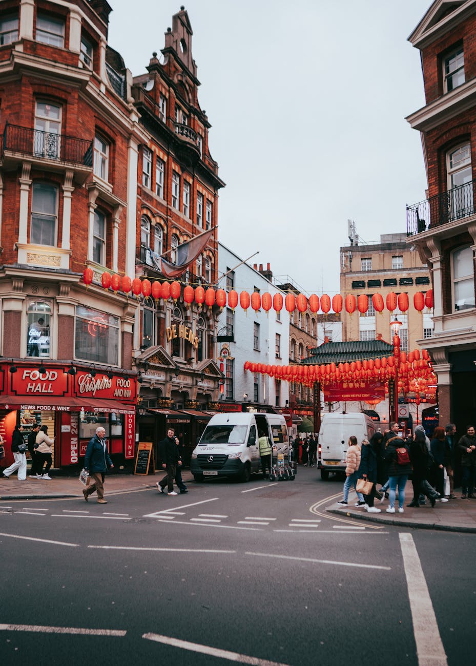 Tourists exploring vibrant streets and restaurants in London Chinatown