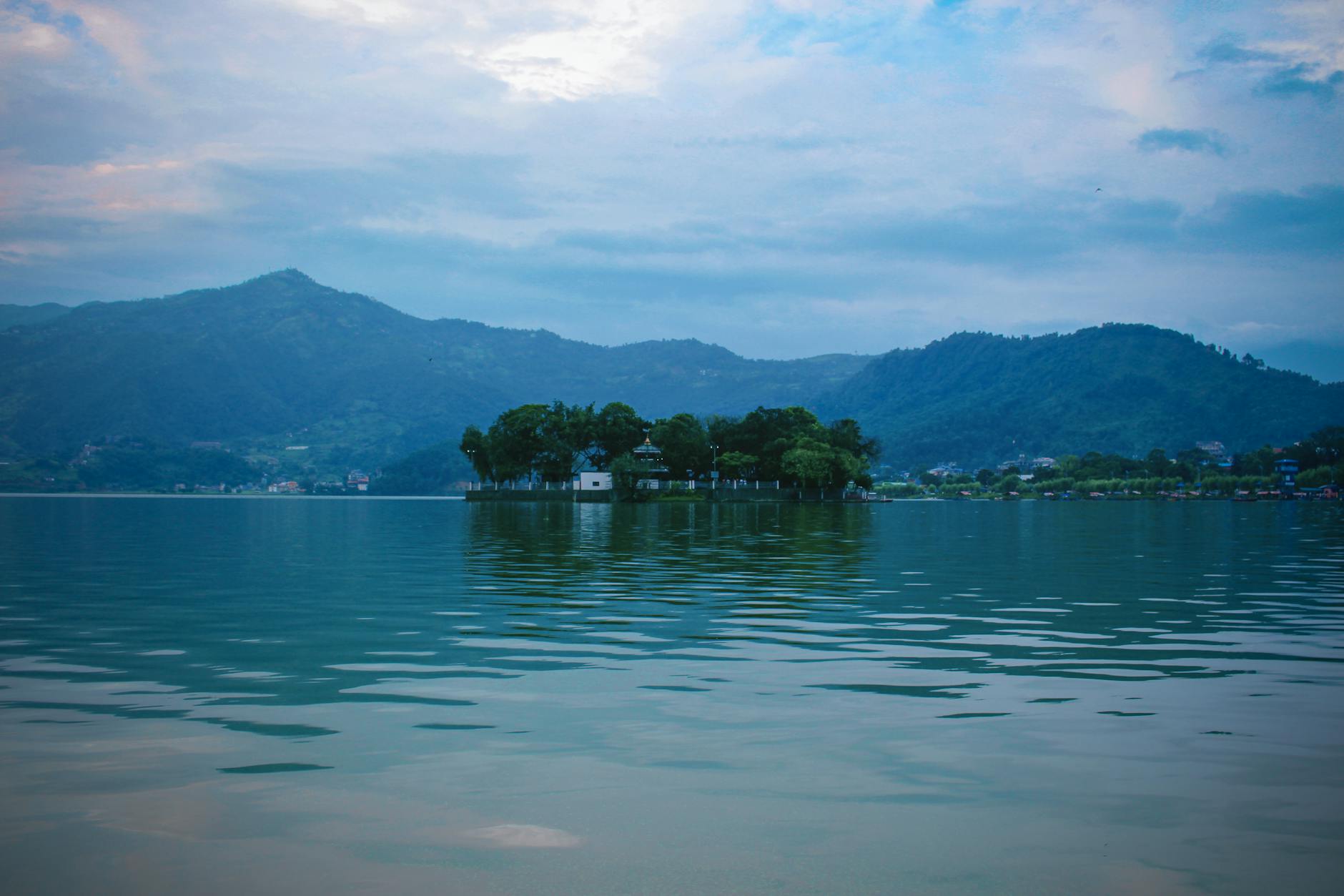 Scenic view of Phewa Lake in Pokhara with Annapurna mountains in the background