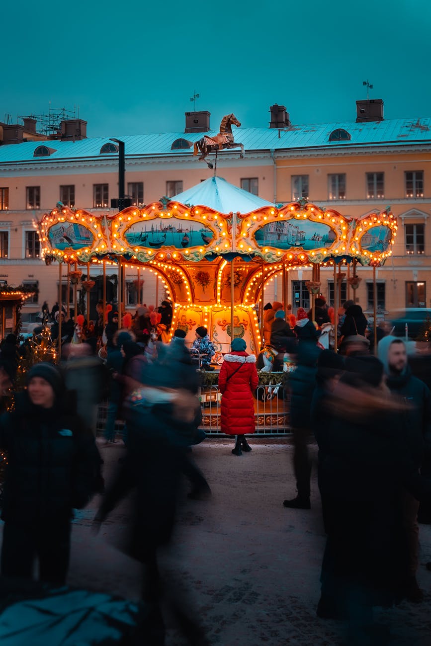 Tourists enjoying mulled wine and holiday treats at Rovaniemi Christmas market