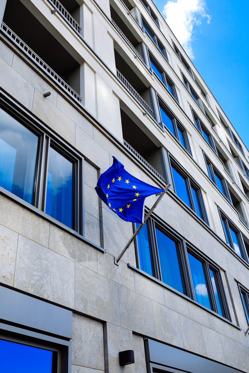 European Union flag waving against a clear blue sky