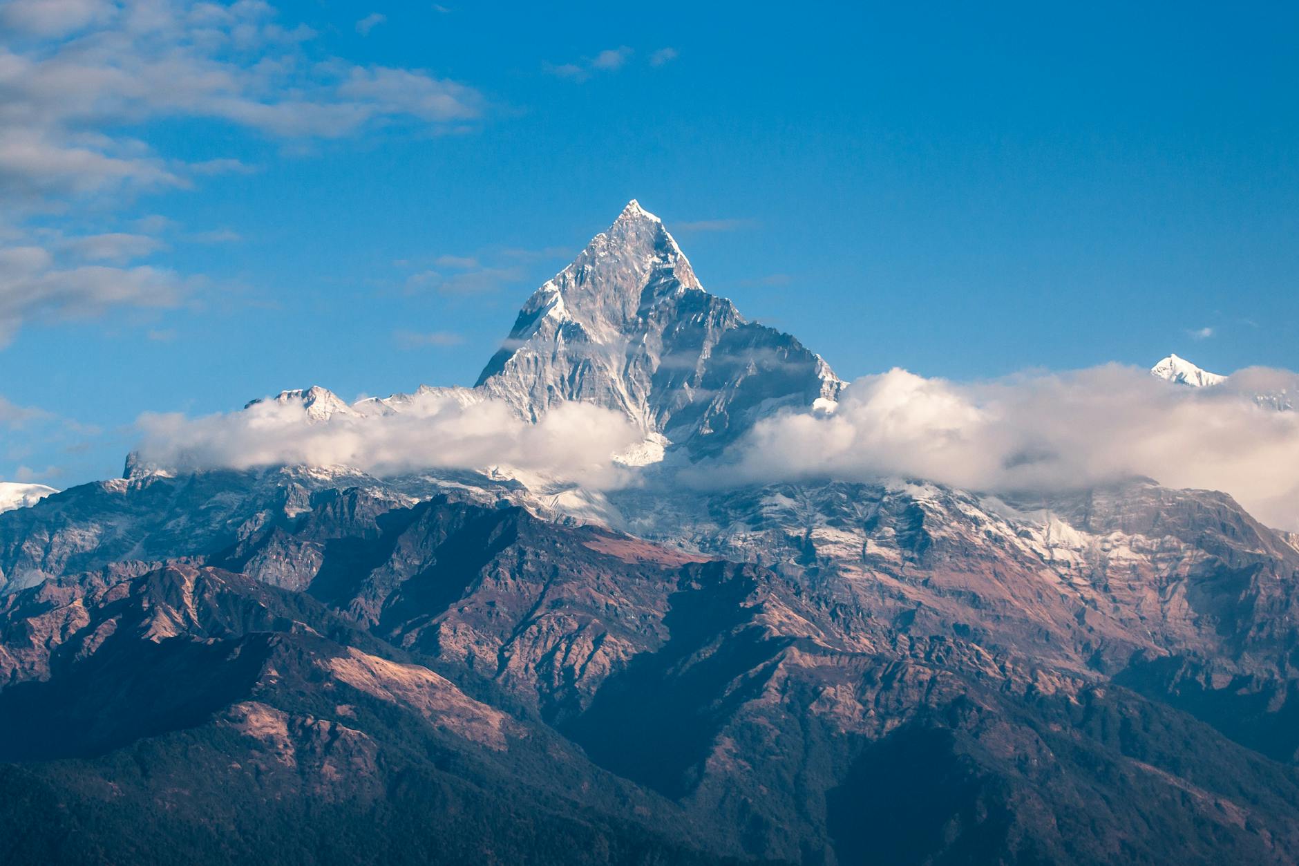 Panoramic view of snow-capped Himalayas in Nepal under clear blue sky