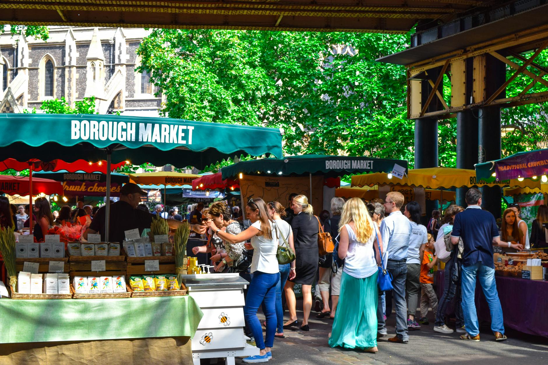 Busy Borough Market in London with fresh produce and food stalls