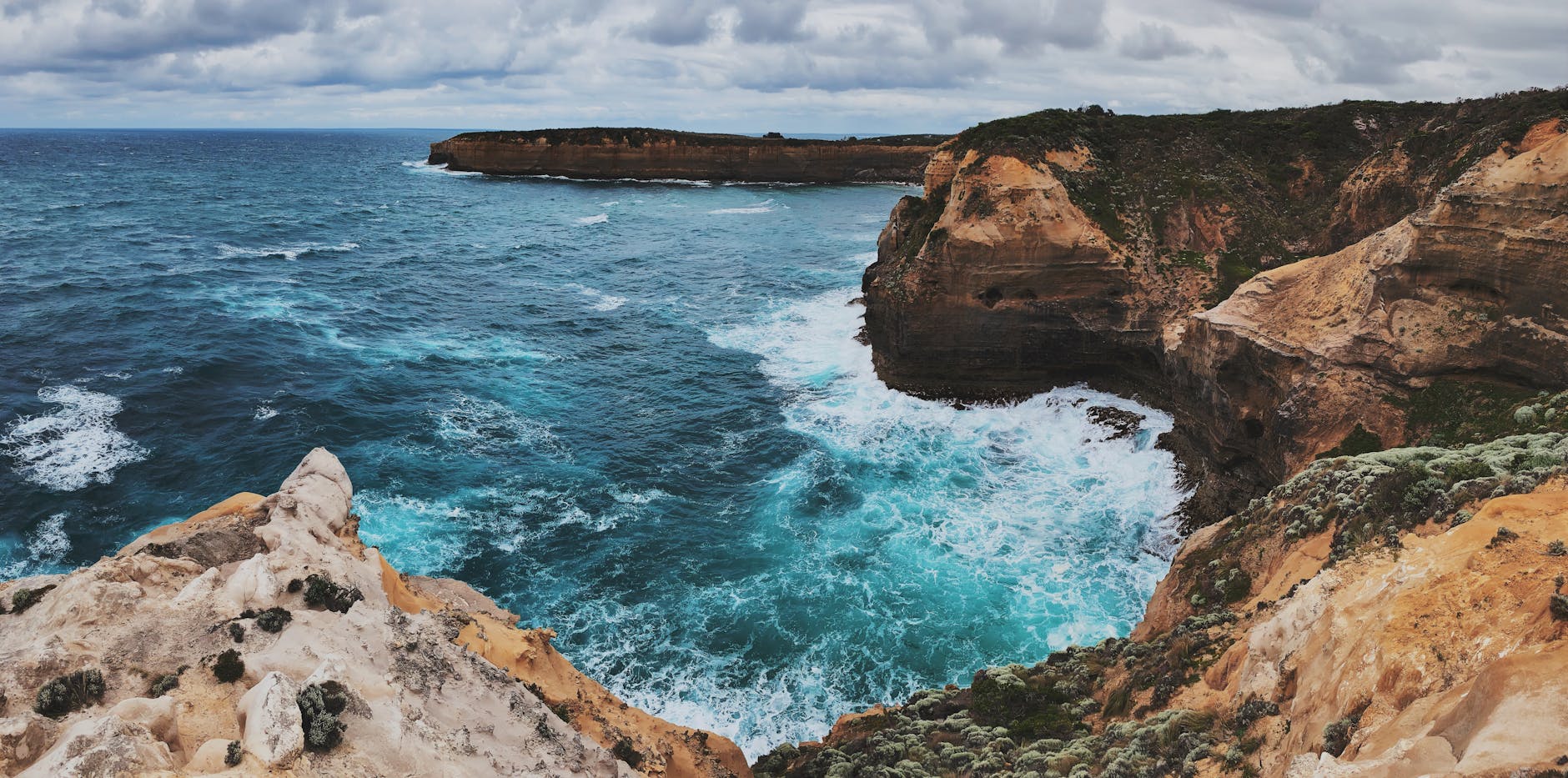 Waves crashing into Loch Ard Gorge along the Great Ocean Road
