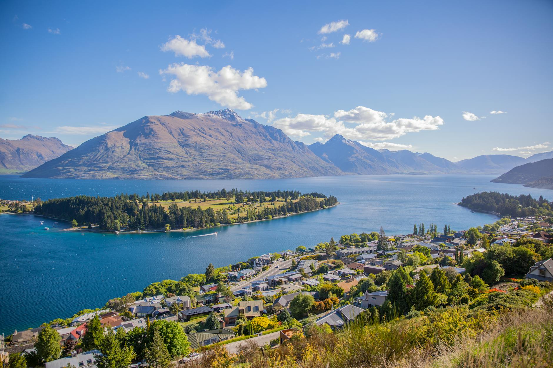 Aerial view of Central Queenstown with Lake Wakatipu and surrounding mountain