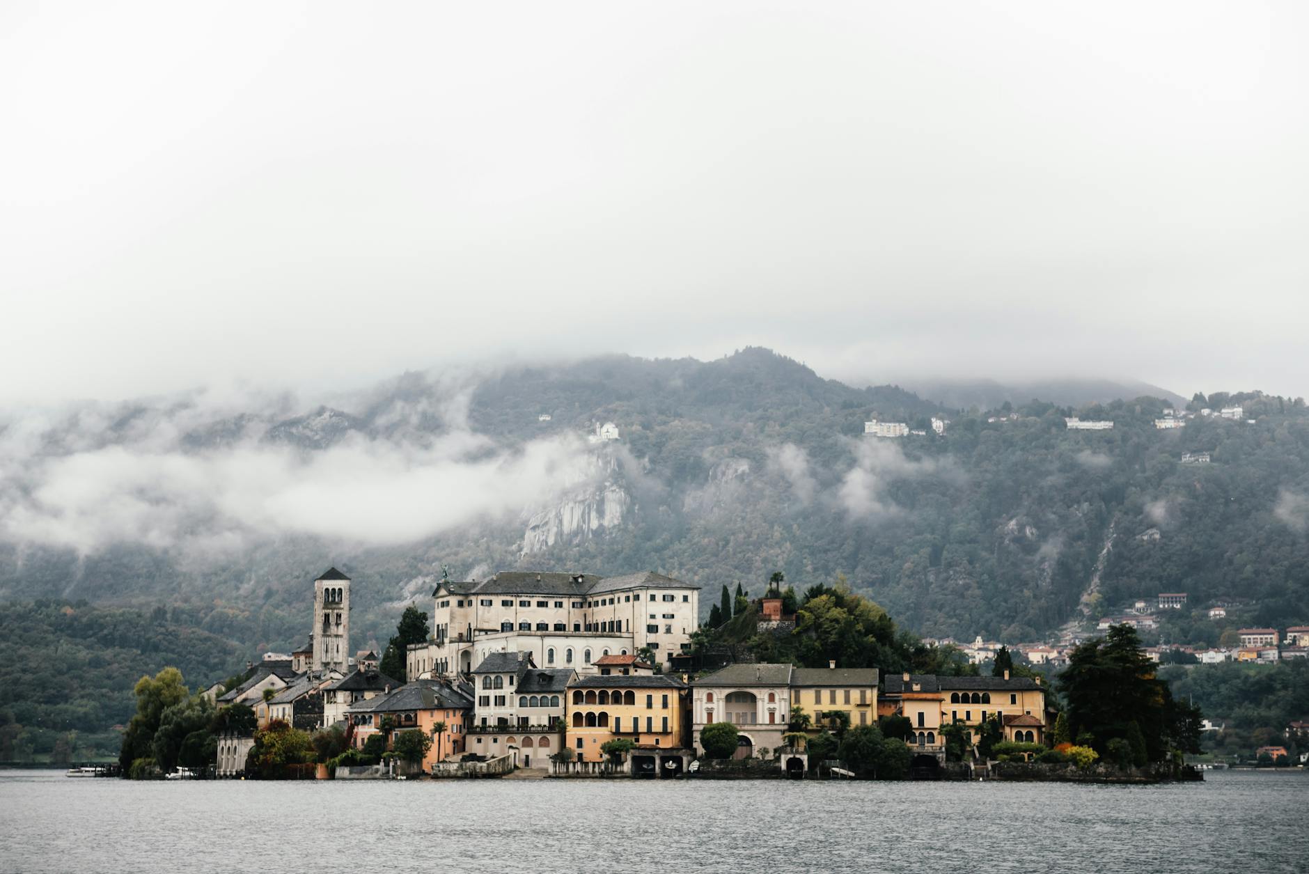 Scenic view of Lake Orta with San Giulio Island and Alps in the background, Italy