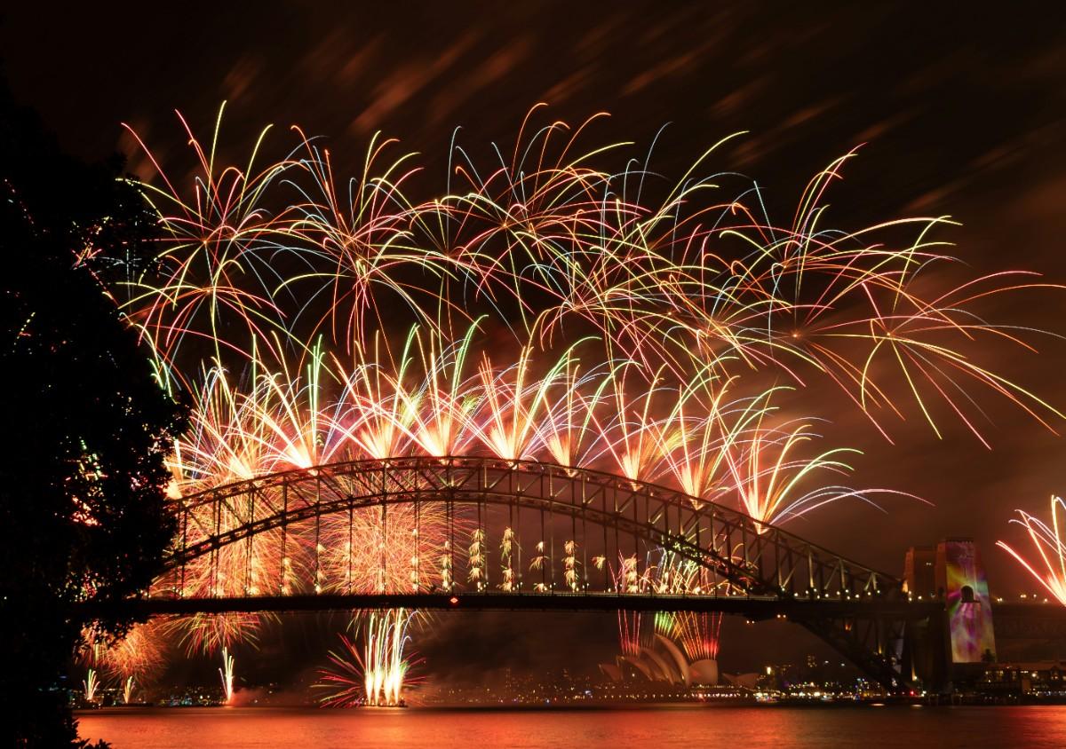 Sydney Opera House Harbour Bridge, New Year fireworks with 1.5 million people celebrating on a summer night