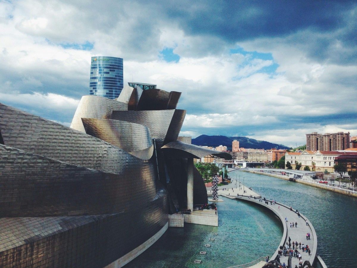 Cityscape of Bilbao Spain with modern architecture and river views