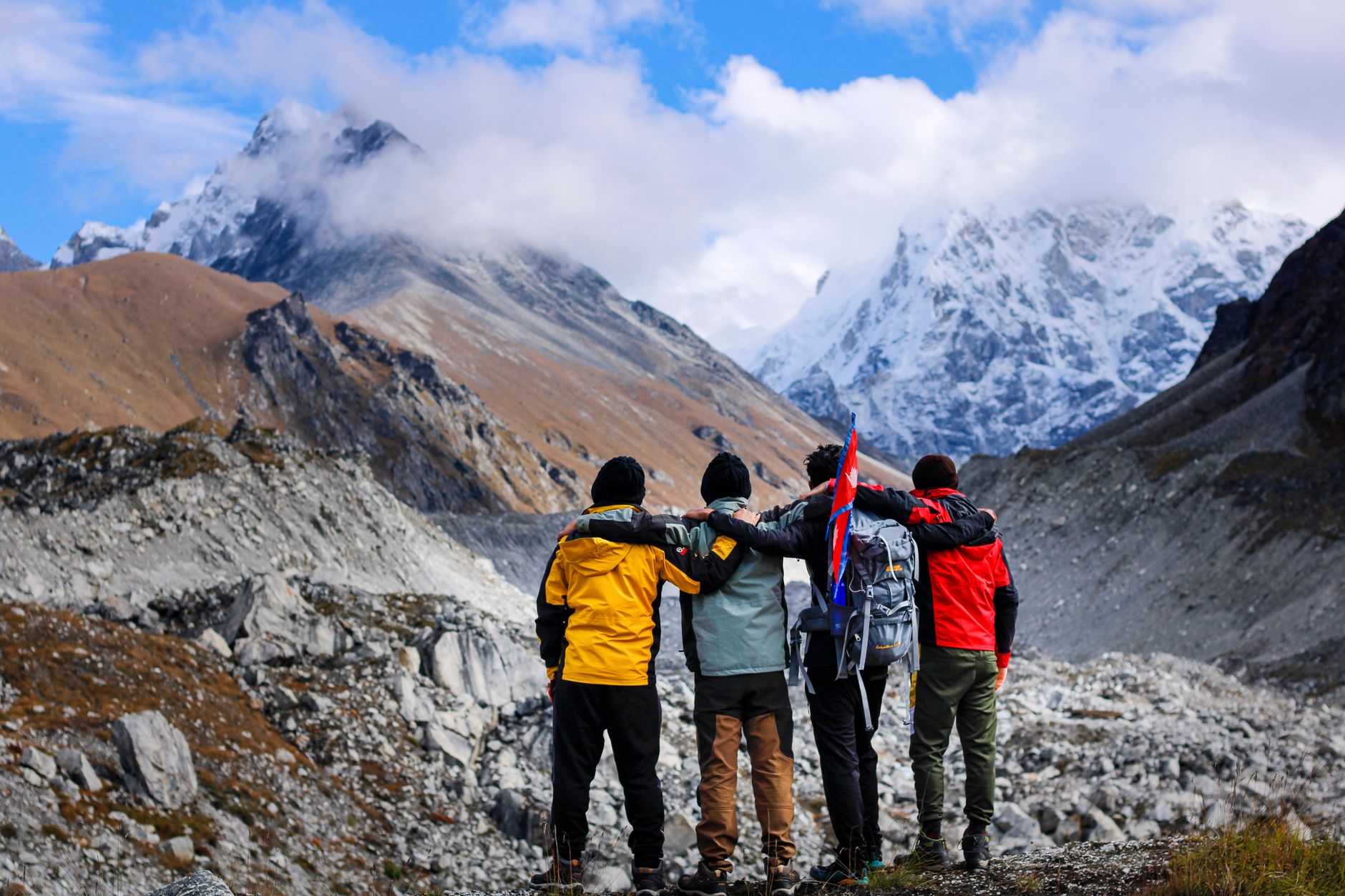 mountaineers looking at himalaya mountains